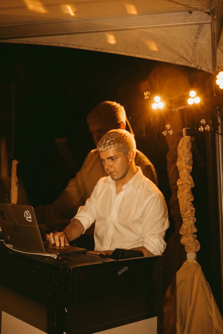 Aureo Sound DJ performing under tent